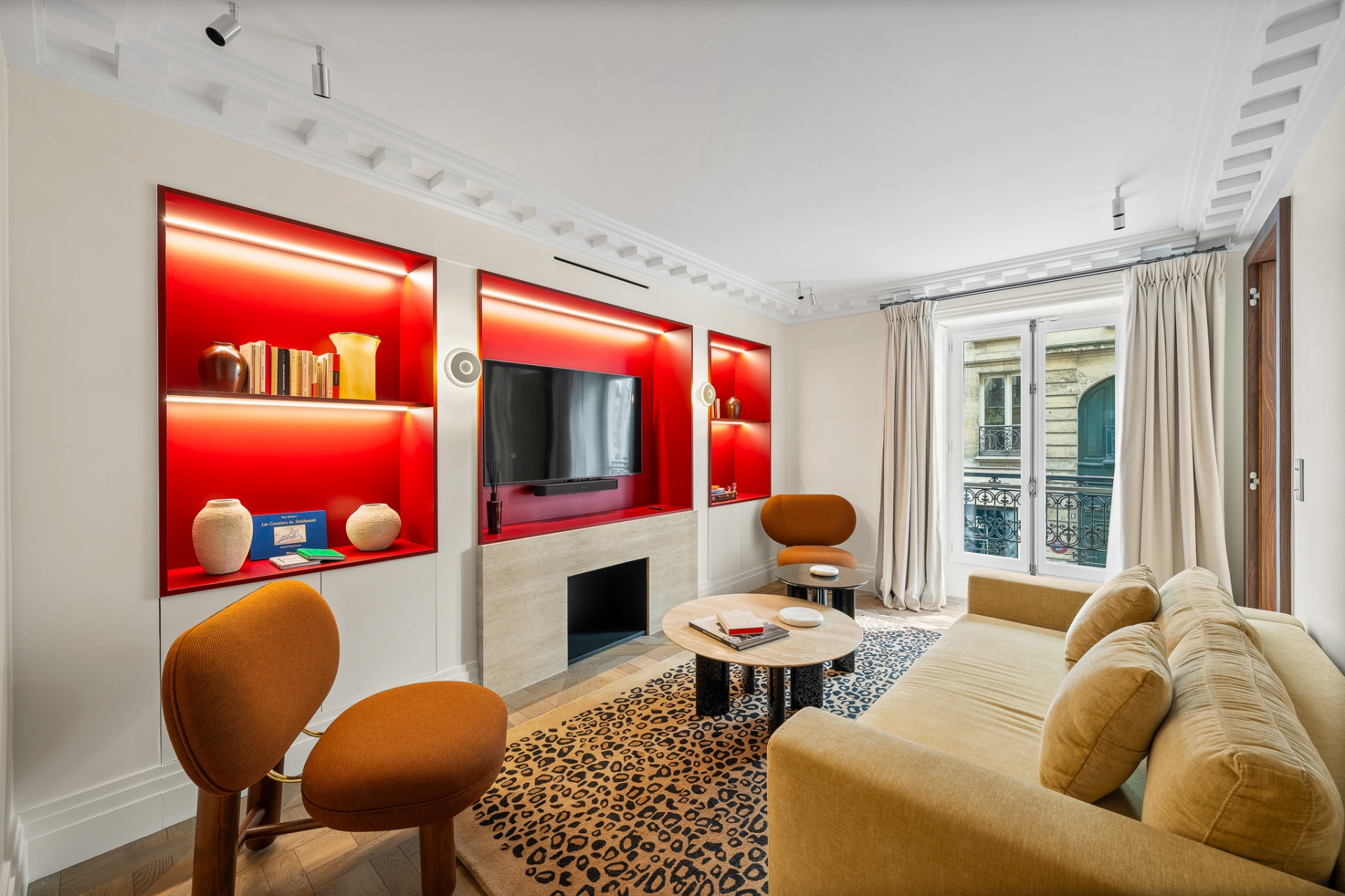 Parisian luxury apartment interior with terracotta shelves and warm light